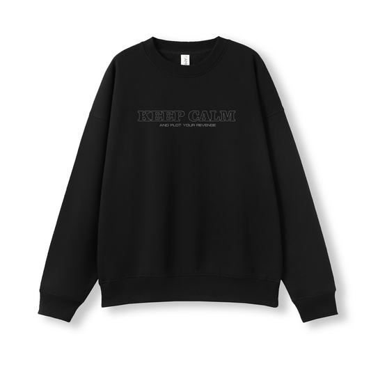 Black sweatshirt with 'KEEP CALM AND PLOT YOUR REVENGE' text on a white background