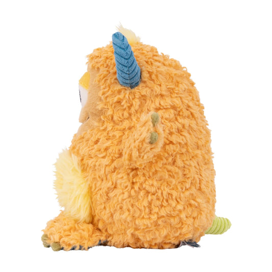 Orange plush toy with a blue horn on a white background