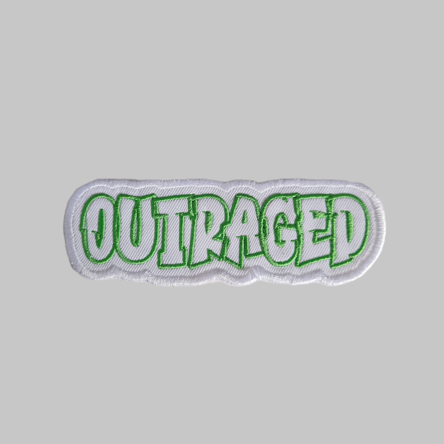 Embroidered Cloth Iron On 'Outraged' Patch