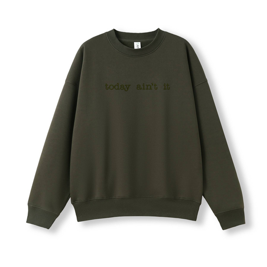 Green sweatshirt with text on a white background