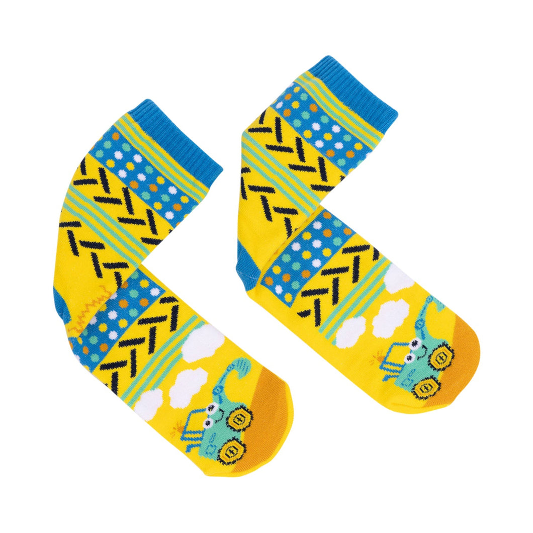 Colorful children's socks with patterns and cartoon characters on a white background