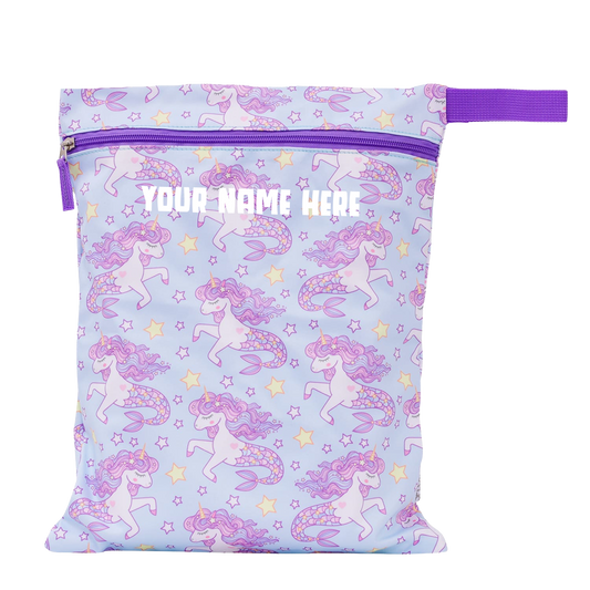 Reusable shopping bag with unicorn pattern and customizable text area on a light blue background